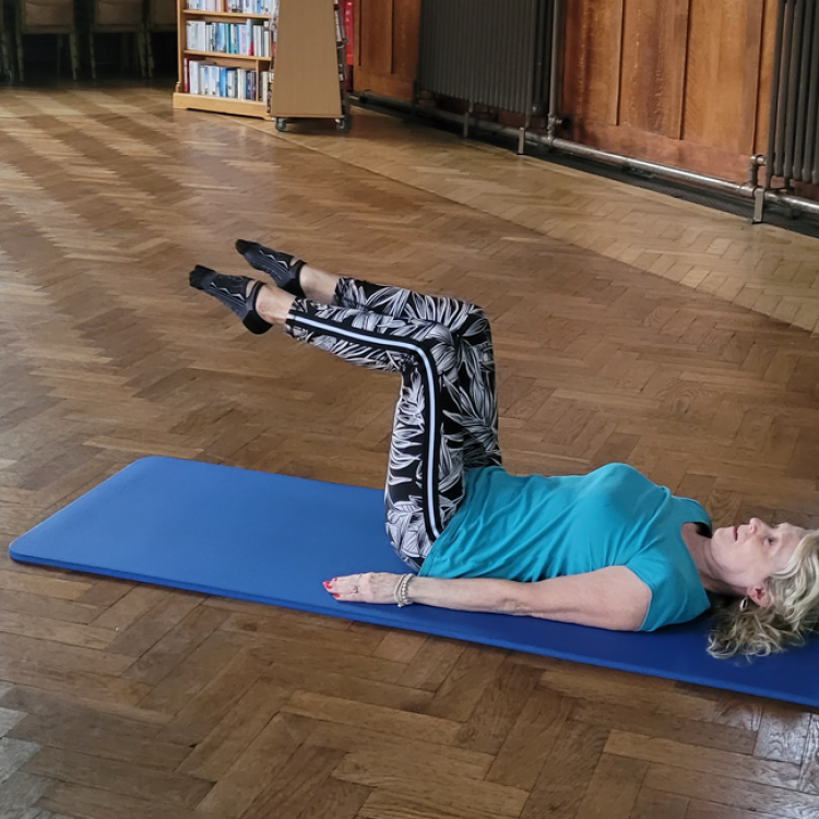 Claire practicing Pilates at St Nicholas Church in Copnor